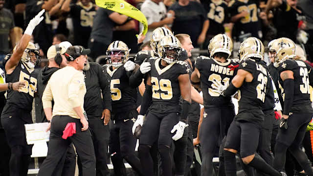 New Orleans Saints cornerback Paulson Adebo (29) celebrates intercepting a Titans pass